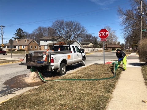 Public Works crew flushing hydrants