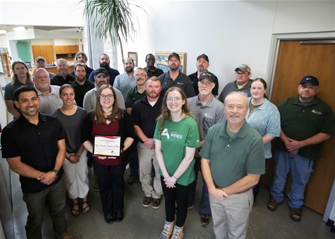 People from the Water Department holding award