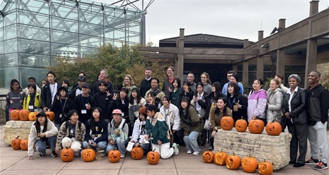 Kids and families posing with pumpkins
