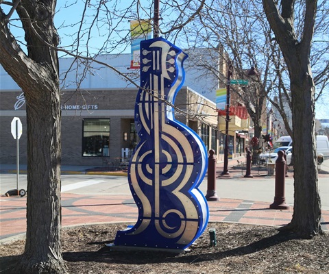 Sculpture of a blue guitar in downtown Ames