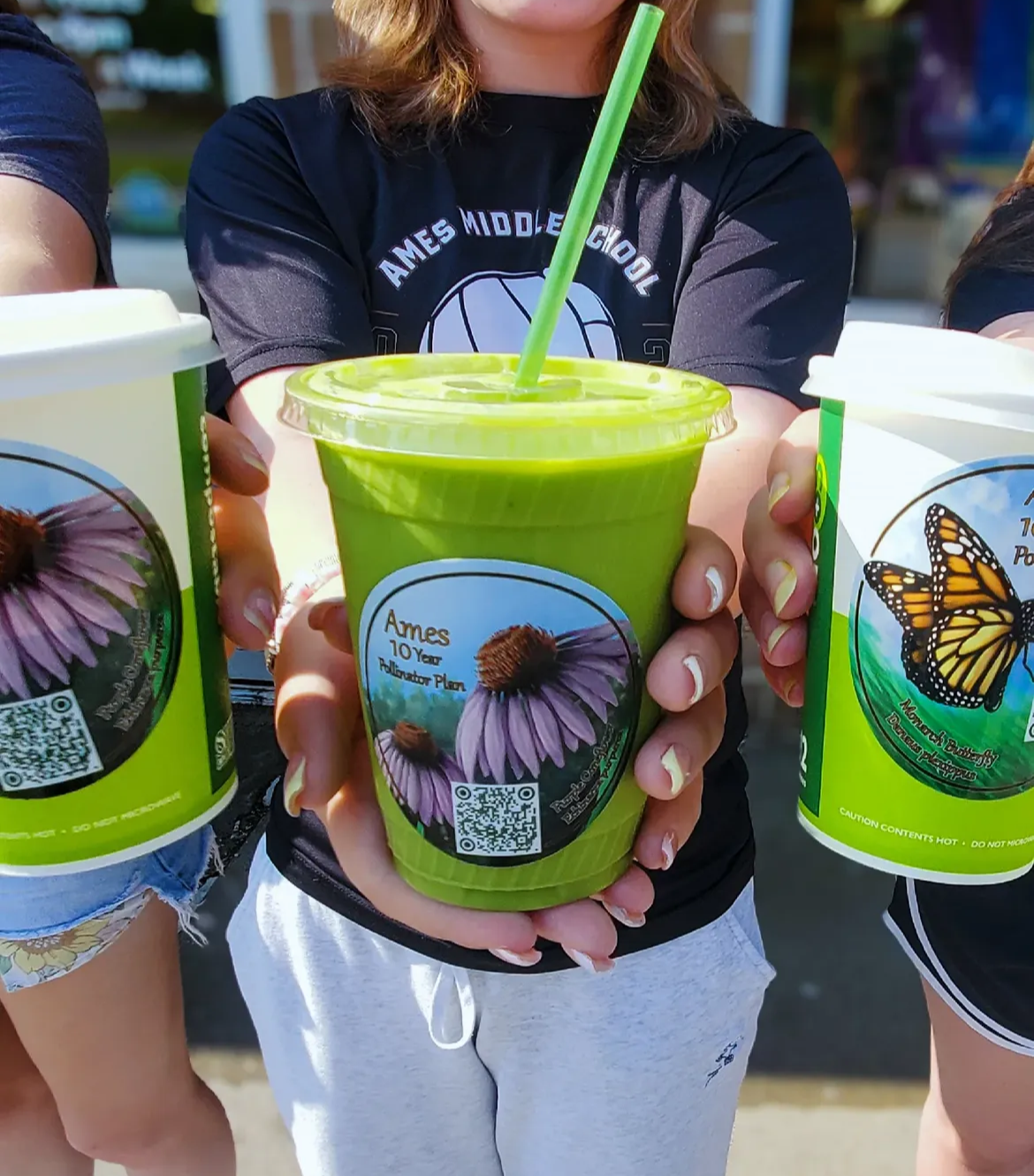 Pollinator Awareness stickers on cups