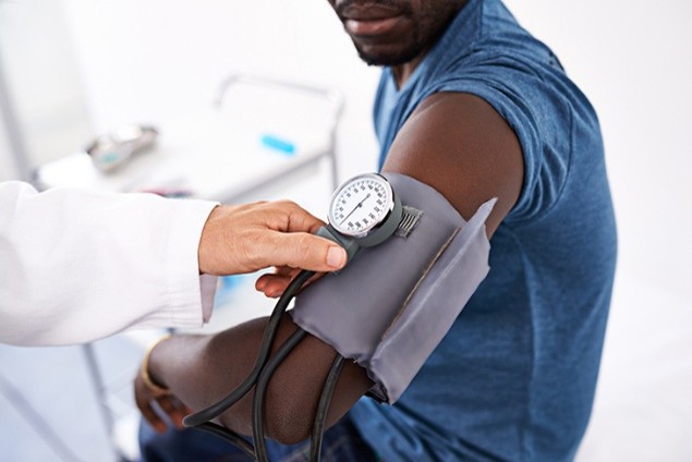 Person getting blood pressure done