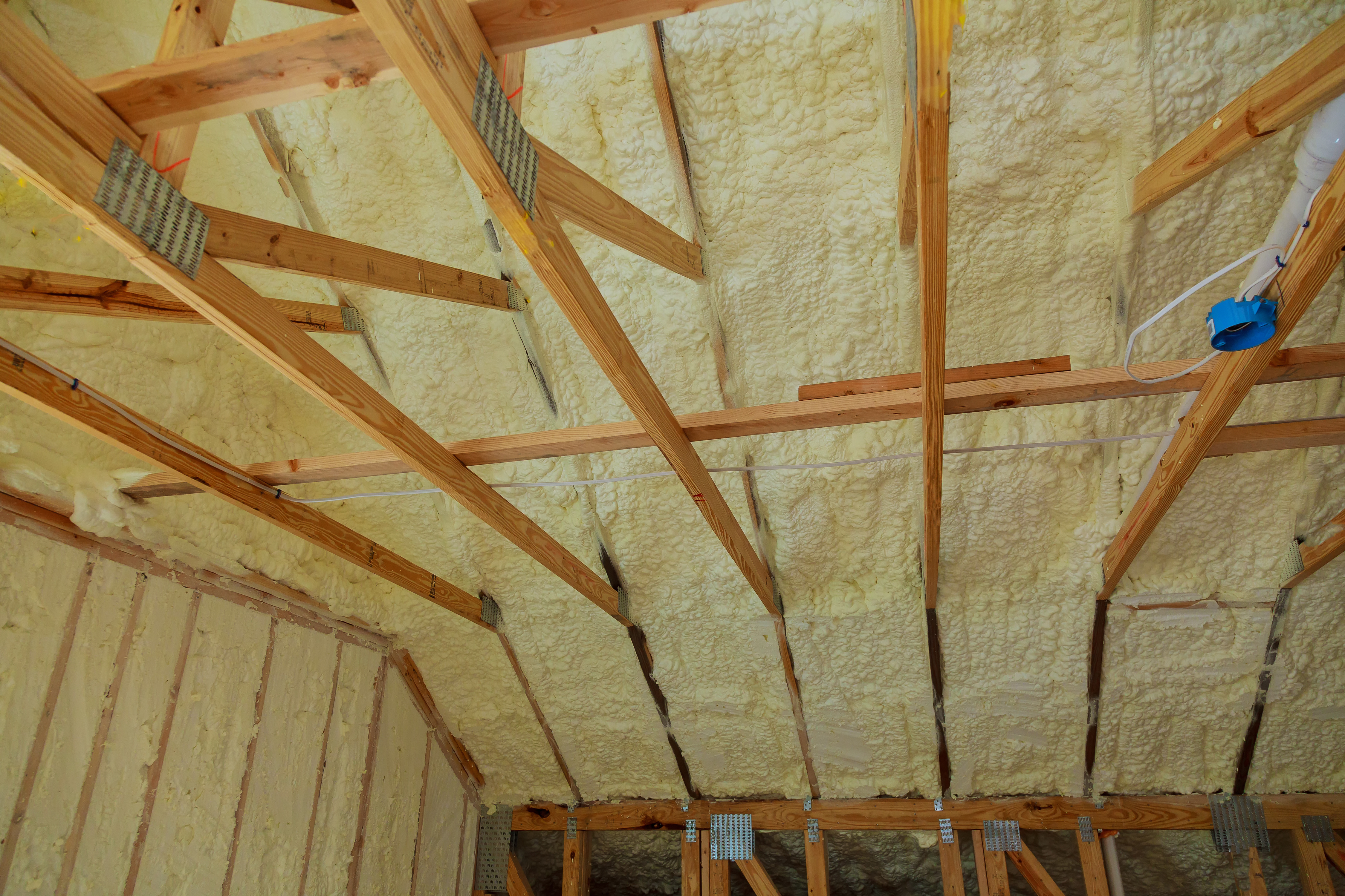 Attic insulation within building.