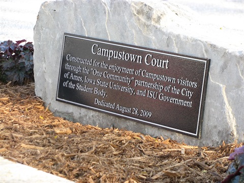 Rock with Campustown Court plaque