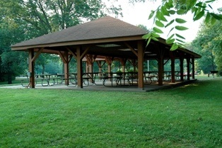 Shelter with picnic tables