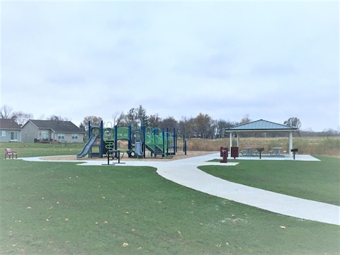 A playground and picnic area at a park