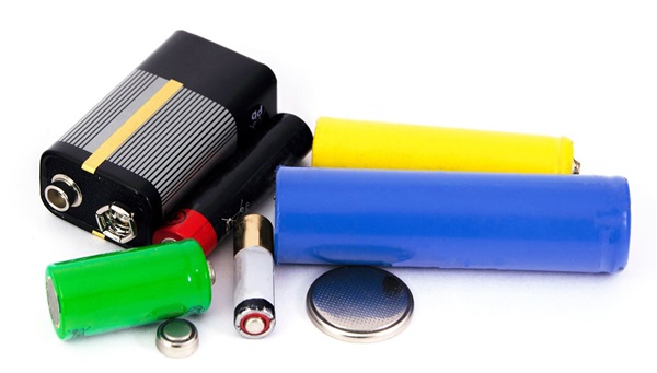 A pile of various sizes of batteries.