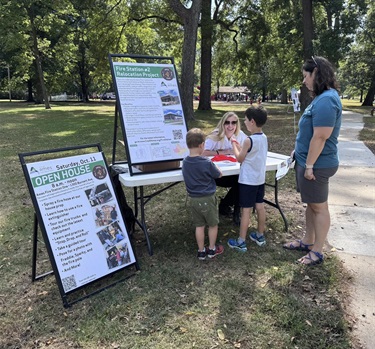 Firefighter talking to residents about fire safety